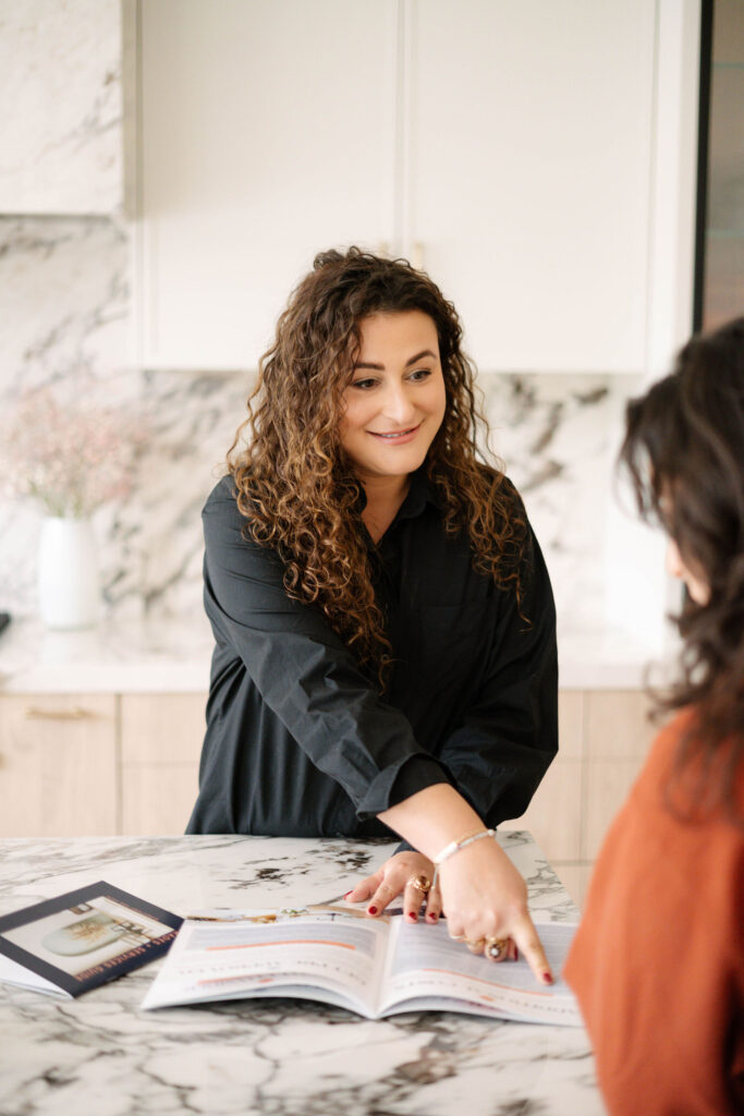 Nicole Shlass working with a client.